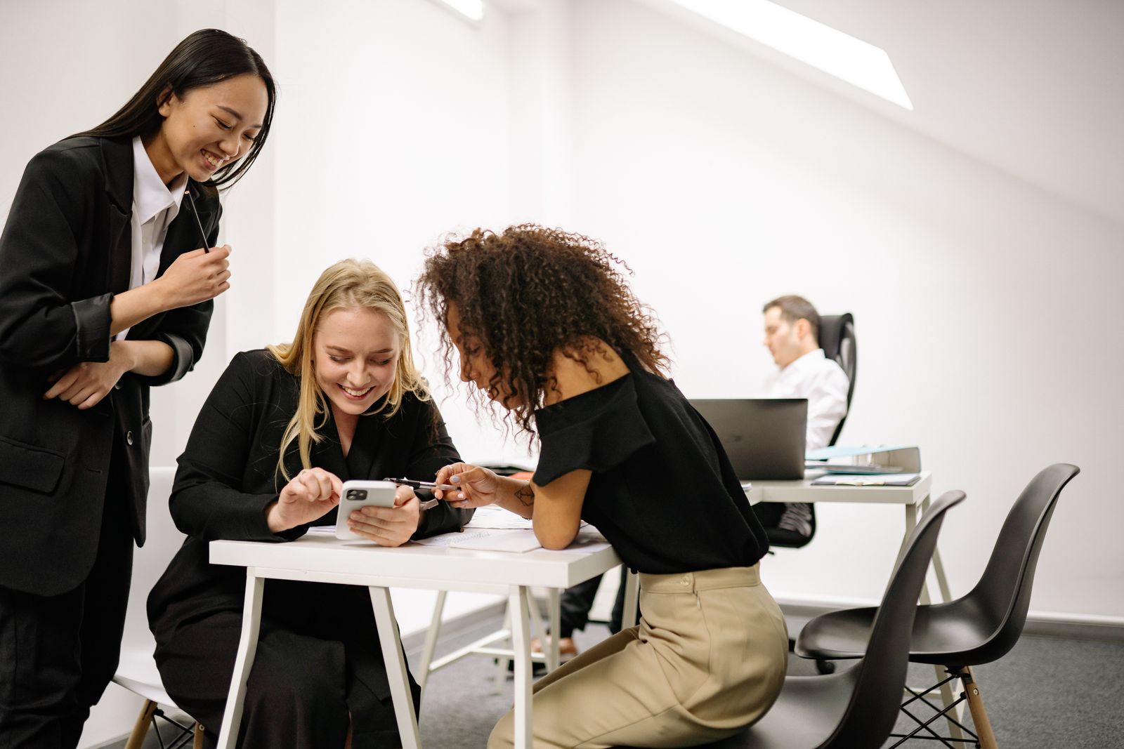 Colleagues working together in a modern office