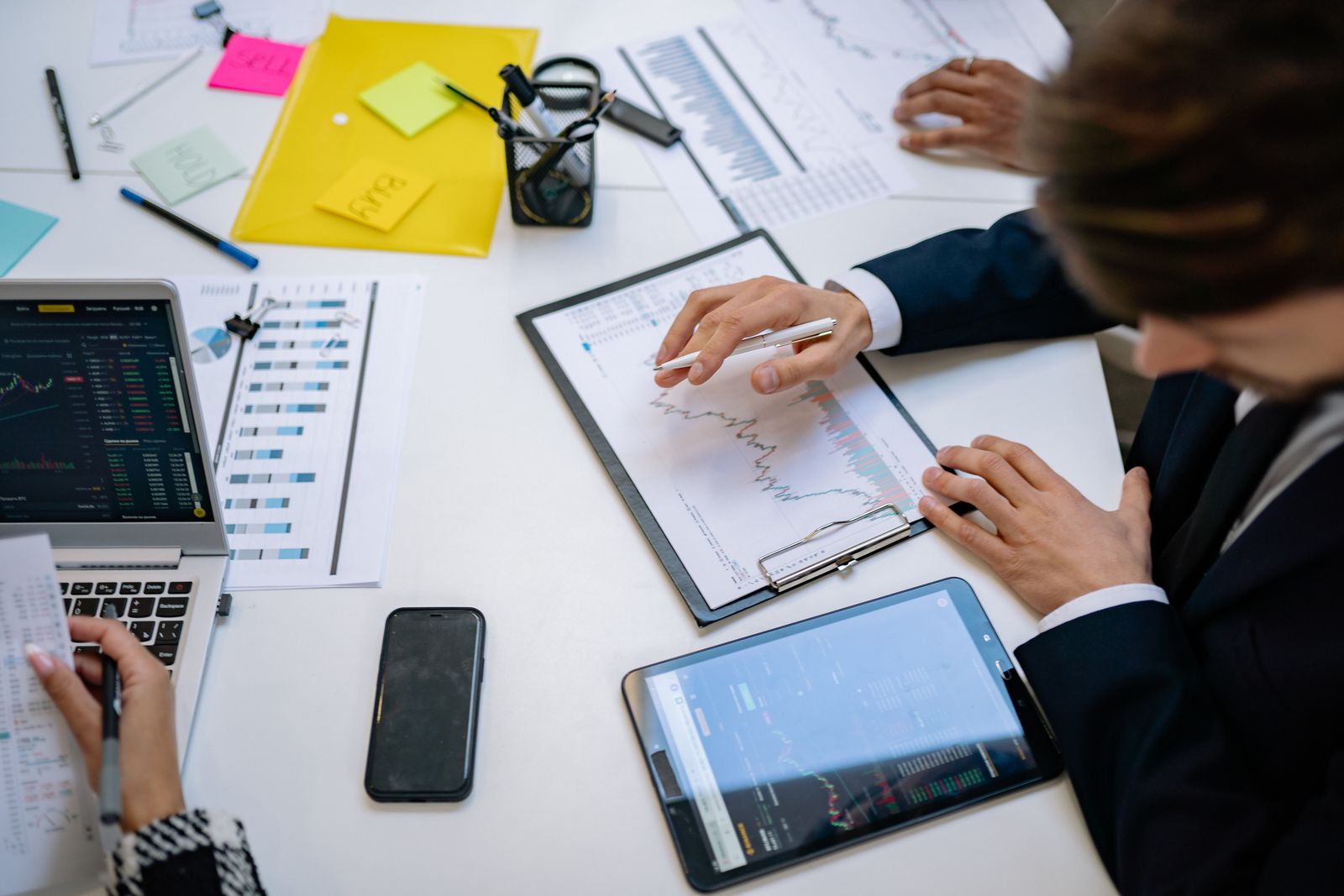 Analysis documents and charts on a desk